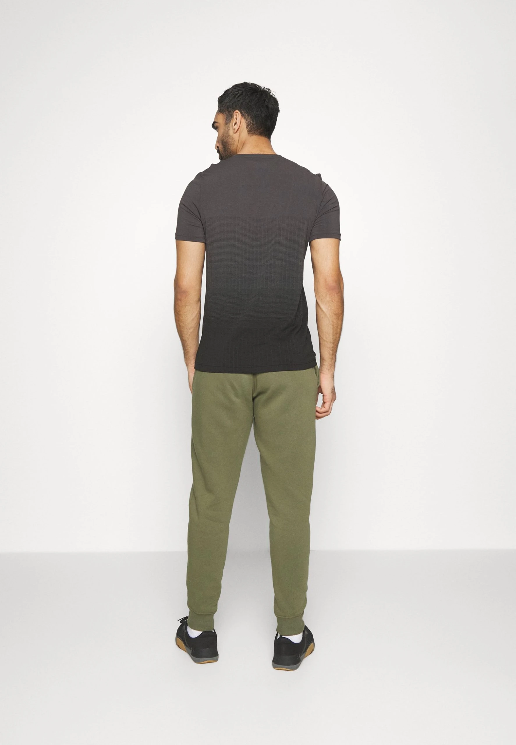 Under Armour RIVAL JOGGERS - Spodnie Treningowe - Marine Od Green/onyx White - obrazek 3